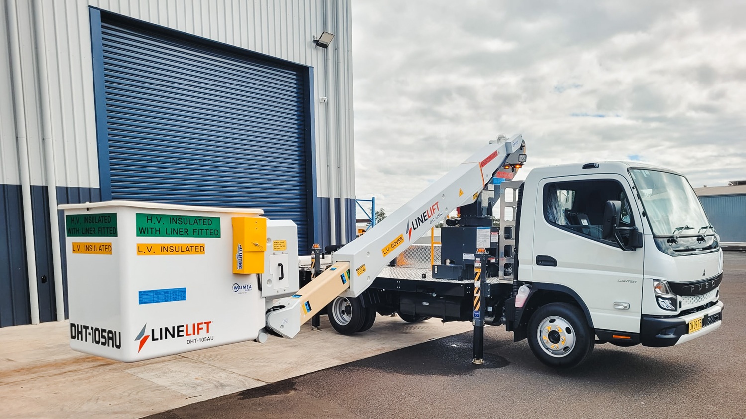 What Is Waimea's Rent to Own Option for Australian EWP Truck Buyers (3) A Waimea-supplied Linelift EWP truck parked on an Australian job site working on poles around trees.